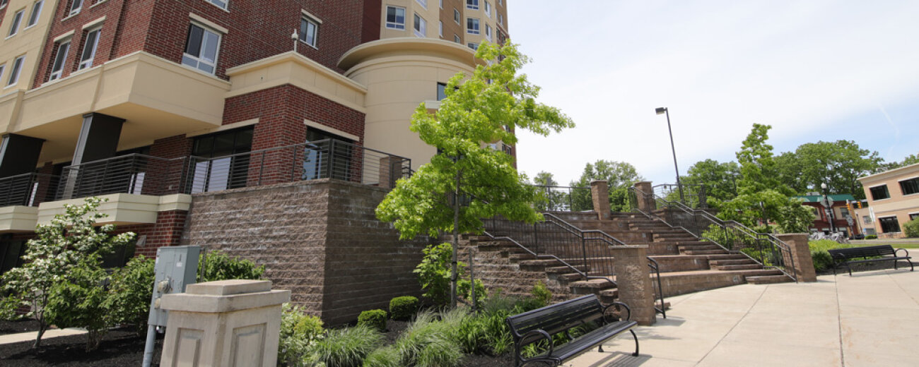 Close-up exterior view of Brooks Crossing Apartments in Rochester, NY.