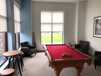 Billiard room at 100 West Water Apartments.