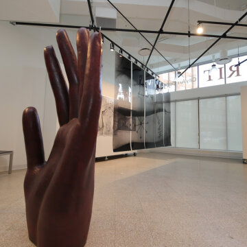 Hand sculpture and other displays at RIT City Art Space.